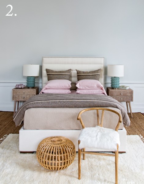 white channel headboard, wood endtables, aqua glass lamps pink and brown bedding, goat skin chair