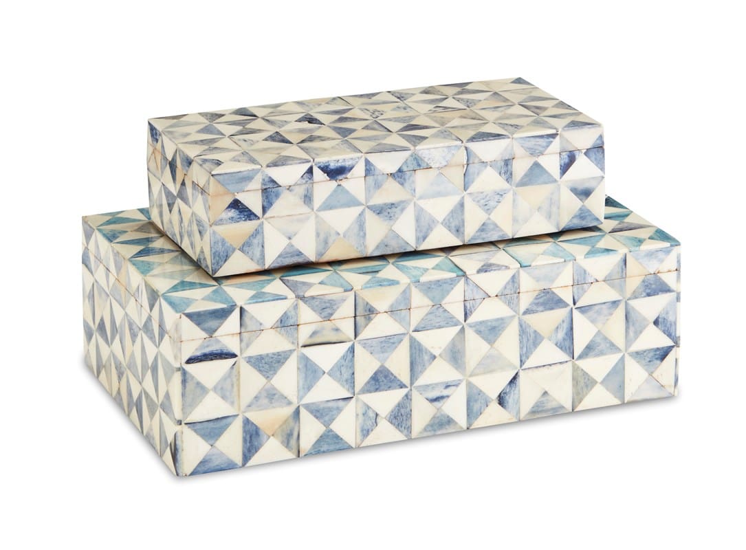 The patterns of these Sky Blue Boxes (set of 2) of the triangular-shaped segments bring this white decorative box a textural, vintage home decor feel.