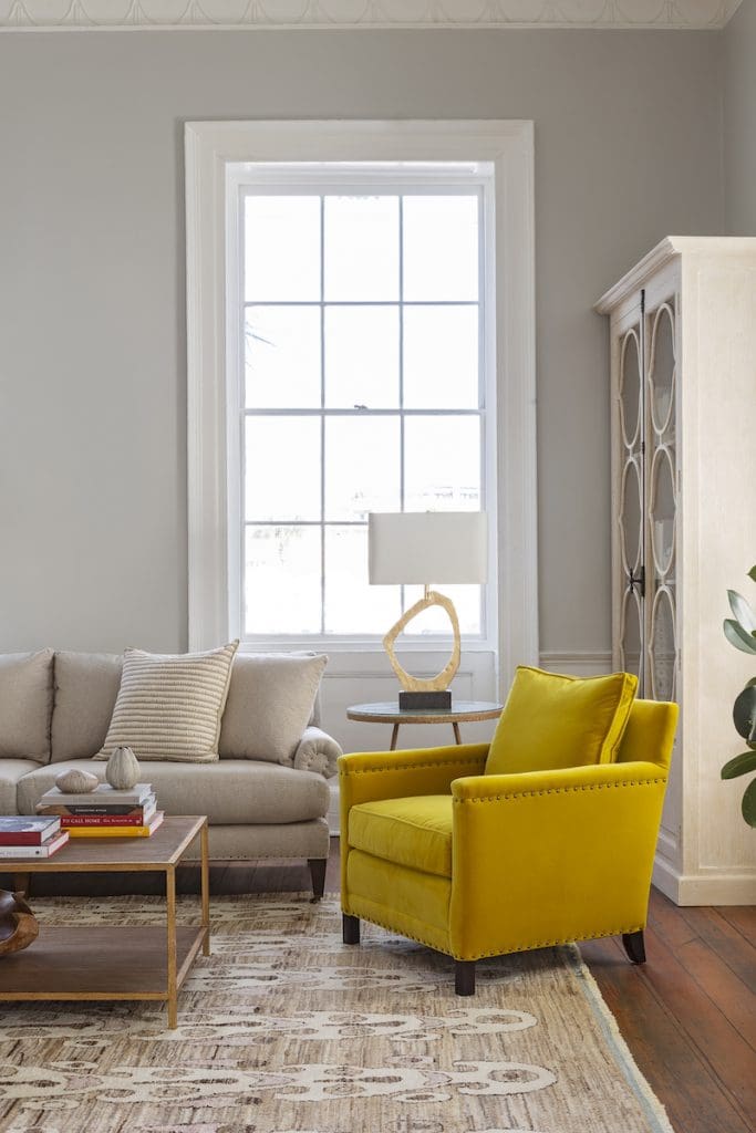Mustard Yellow Chair by Mt Pleasant furniture store GDC brightens a neutral living room