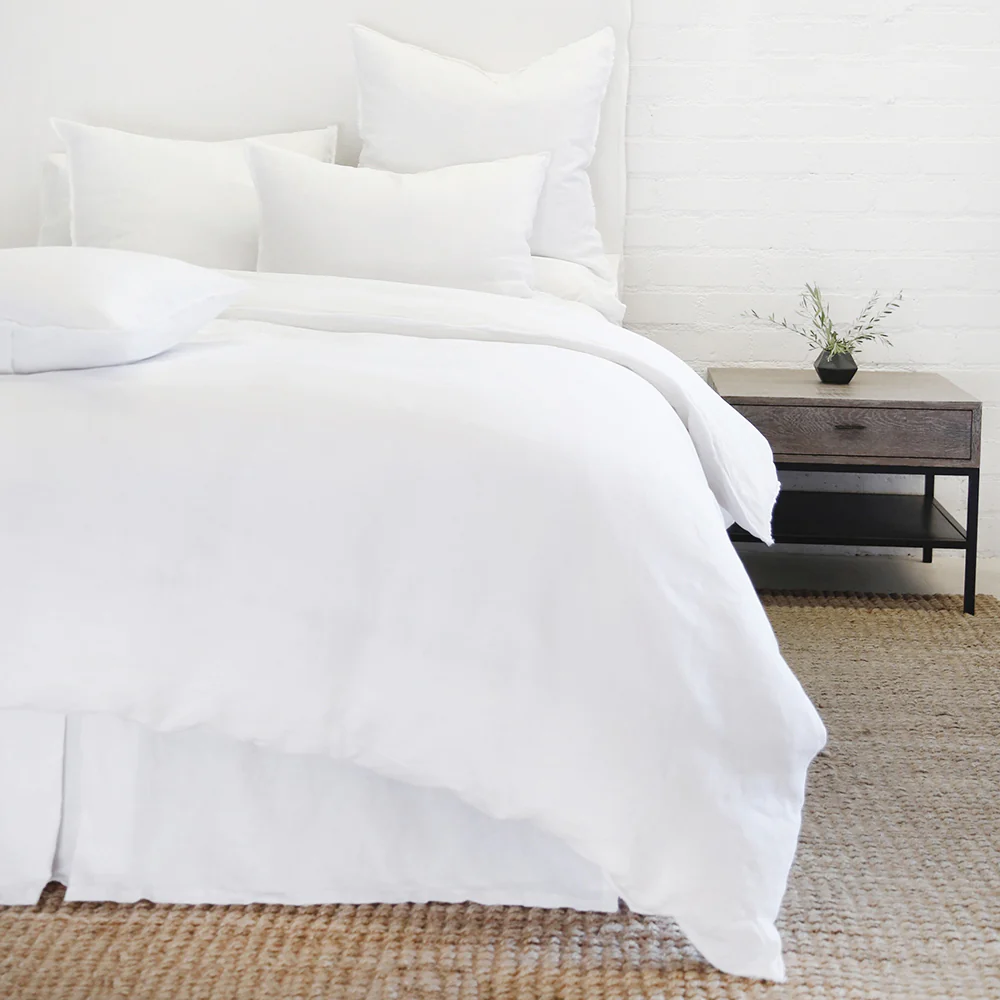 bed with white bed set